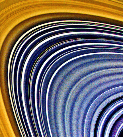 A Voyager 2 spacecraft saturn fly-by image of some of the rings. Voyager 1 is now leaving the solar system, traveling at a speed of $3    imes$ the sun-earth distance per year.
