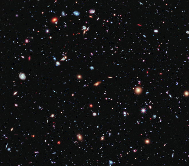 This is the Hubble eXtreme Deep Field, a compilation of hundreds of days of observation of a single dime-sized patch on the sky in the constellation, Fornax. Every spot is a galaxy, some nearby and some at the edge of our ability to see.